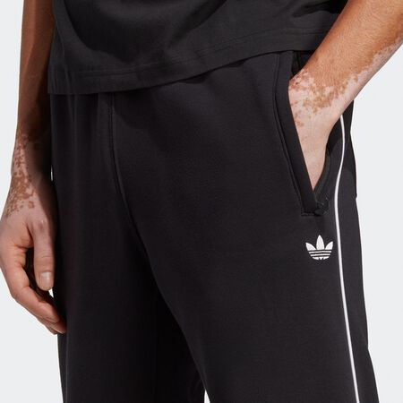 Compra adidas Originals Pantalón chàndal adicolor Next black Pantalones de entrenamiento en SNIPES
